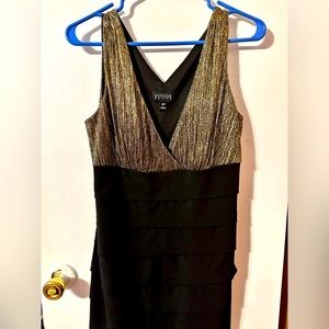 Gorgeous body forming mini dress. It is absolutely stunning!!